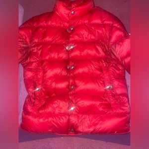 Red moncler jacket.